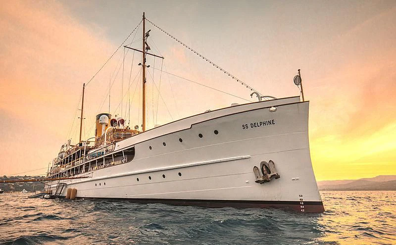 a large white boat in the water aboard SS DELPHINE Yacht for Sale
