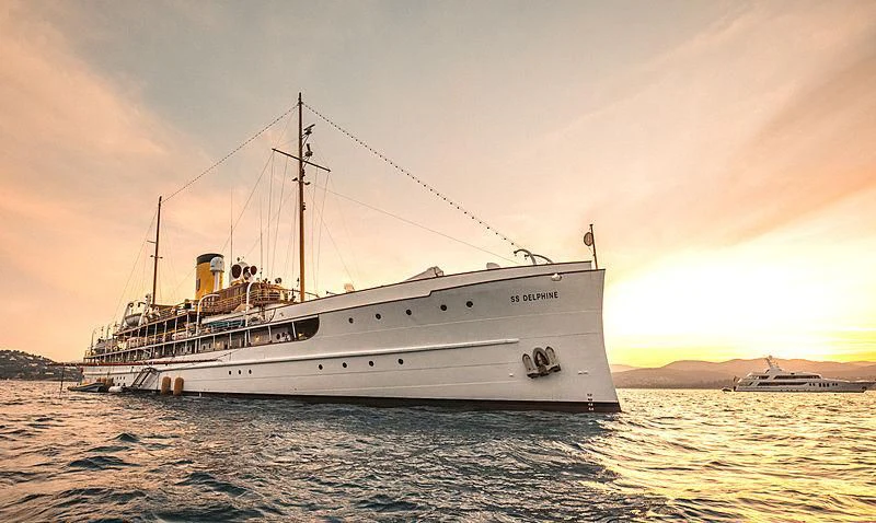 a large ship in the water aboard SS DELPHINE Yacht for Sale