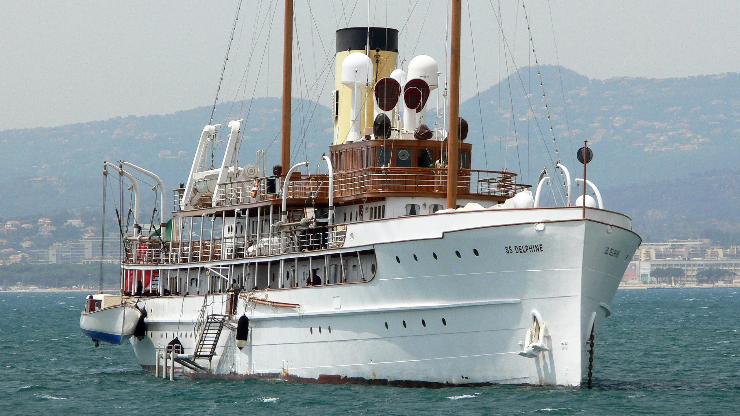 a large white boat in the water aboard SS DELPHINE Yacht for Sale