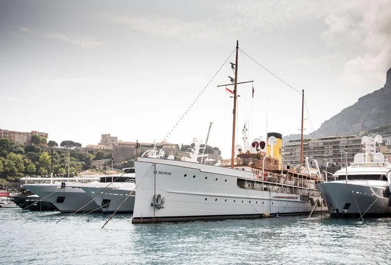 a large white boat sits in the water aboard SS DELPHINE Yacht for Sale