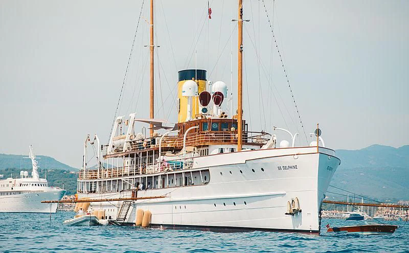 a large white boat in the water aboard SS DELPHINE Yacht for Sale