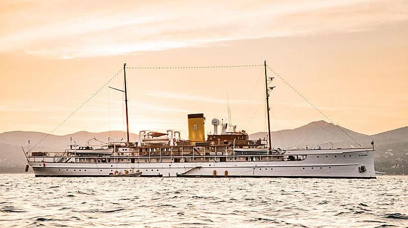 a large ship in the water aboard SS DELPHINE Yacht for Sale