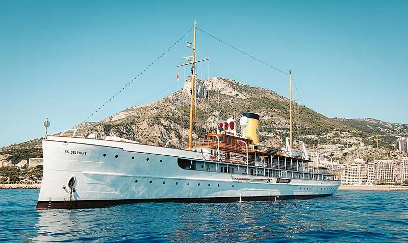 a large ship in the water aboard SS DELPHINE Yacht for Sale