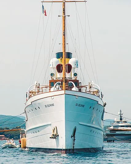 a large white boat aboard SS DELPHINE Yacht for Sale