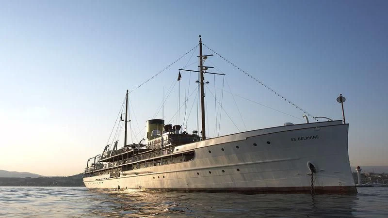 a large ship in the water aboard SS DELPHINE Yacht for Sale
