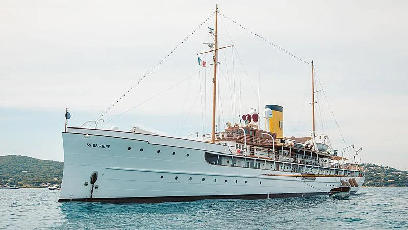 a large white boat in the water aboard SS DELPHINE Yacht for Sale