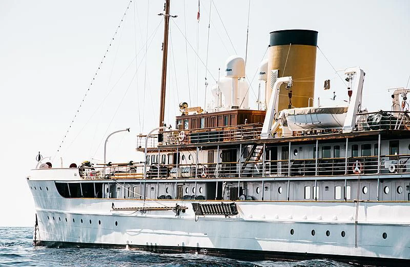 a large white boat aboard SS DELPHINE Yacht for Sale