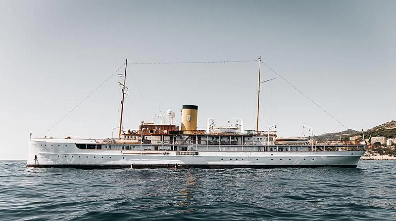 a large white boat in the water aboard SS DELPHINE Yacht for Sale