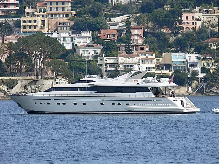 a white boat on the water aboard LUMINOUS Yacht for Sale