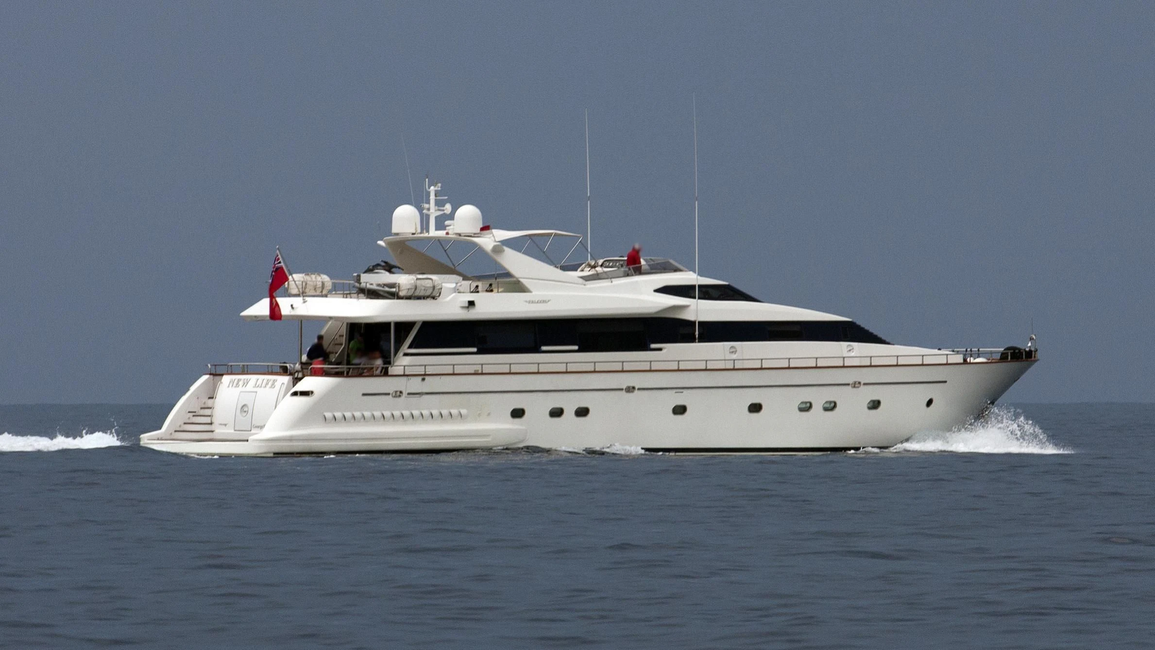 a white yacht on the water aboard LUMINOUS Yacht for Sale