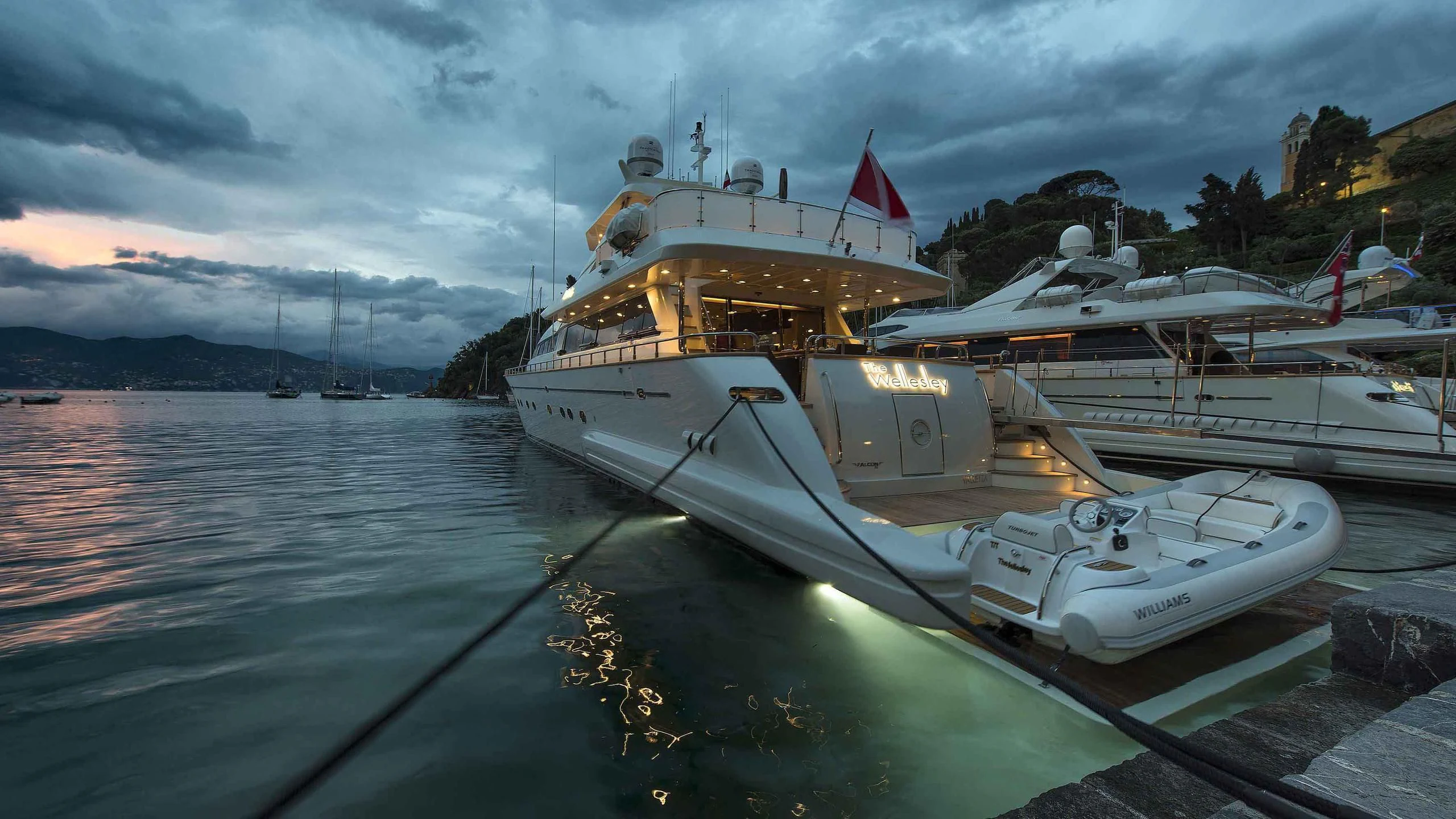 a boat docked at a dock aboard LUMINOUS Yacht for Sale