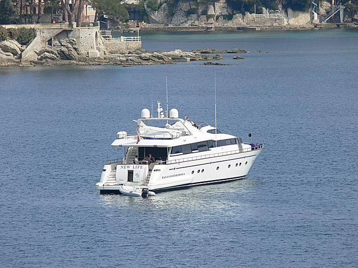 a white boat in the water aboard LUMINOUS Yacht for Sale