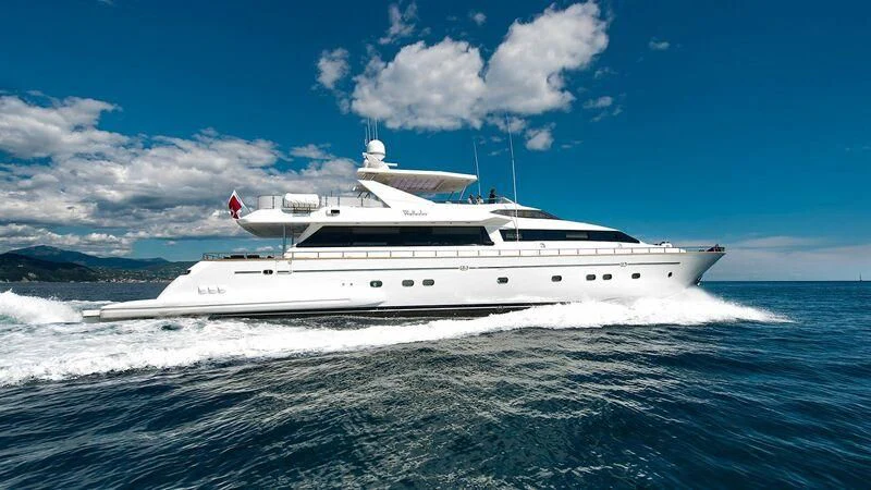a white yacht on the water aboard LUMINOUS Yacht for Sale