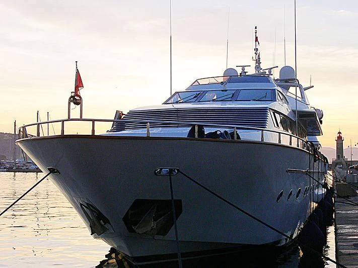 a boat docked at a pier aboard LUMINOUS Yacht for Sale
