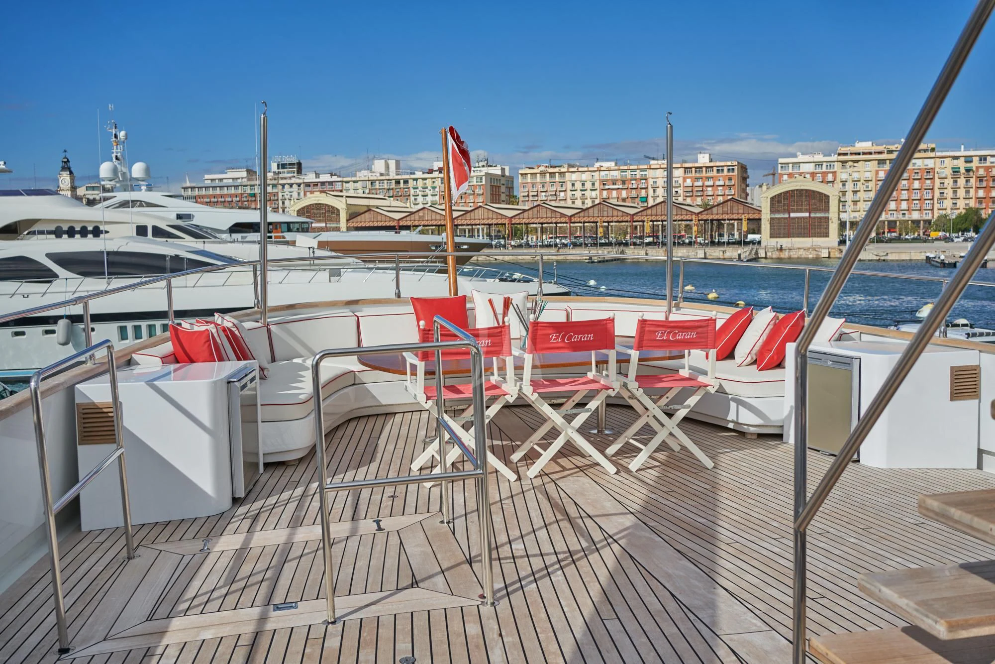 a deck with chairs and tables on it aboard DENEB'S DAUGHTERS Yacht for Sale