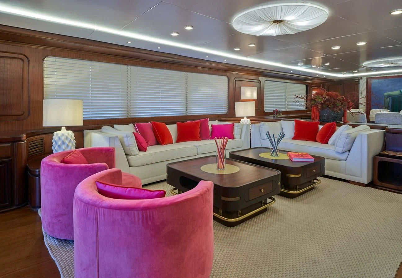 a living room with a couch and a table aboard DENEB'S DAUGHTERS Yacht for Sale