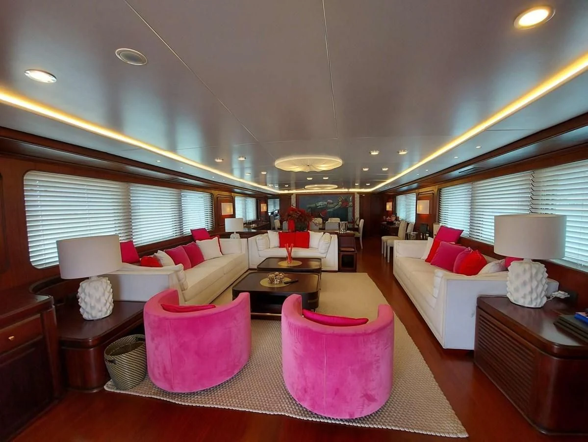 a living room with a couch and a table aboard DENEB'S DAUGHTERS Yacht for Sale