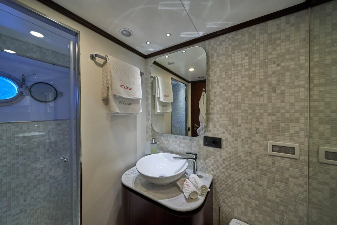 a bathroom with a sink and a mirror aboard DENEB'S DAUGHTERS Yacht for Sale