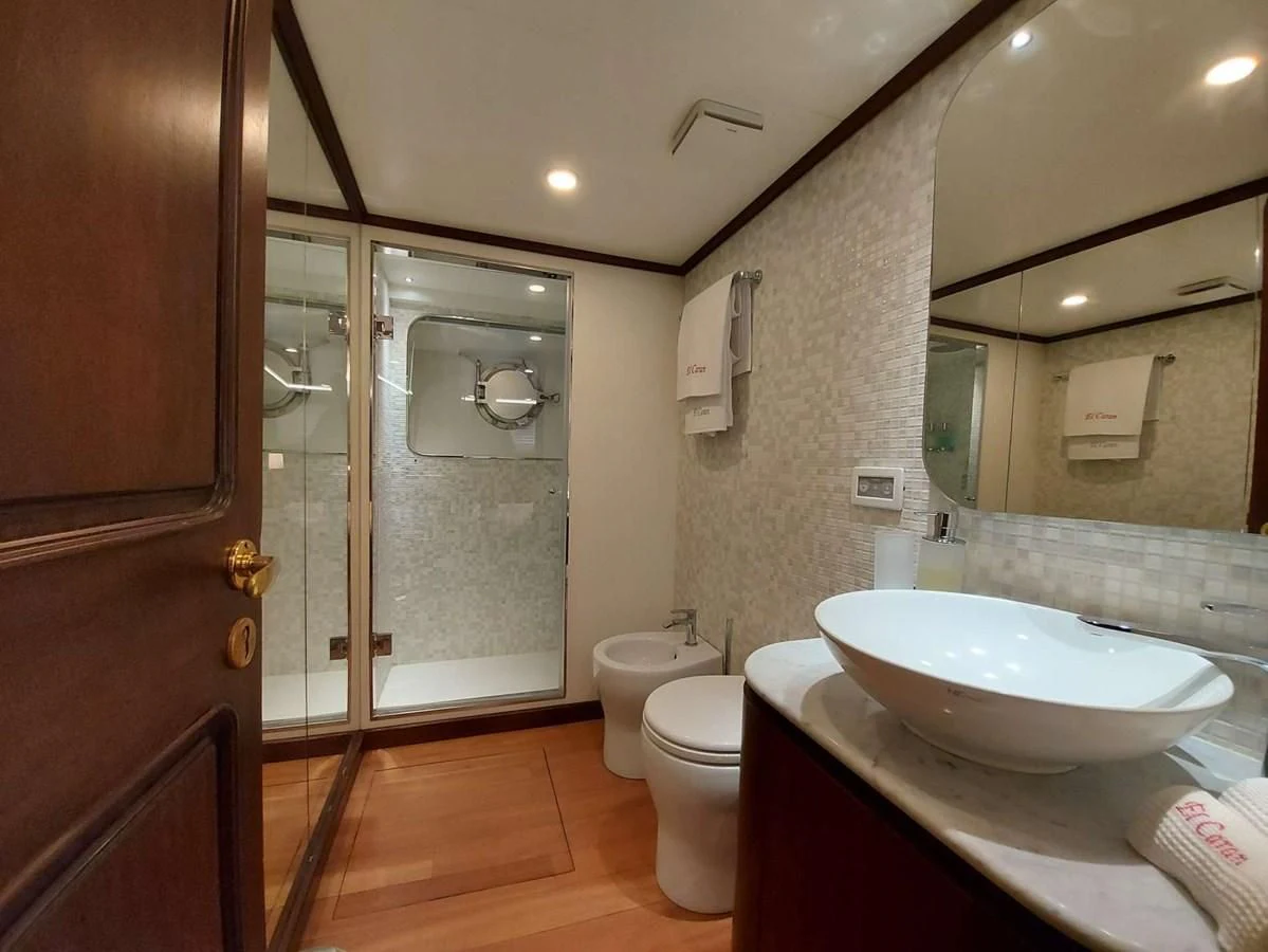 a bathroom with a sink toilet and a shower aboard DENEB'S DAUGHTERS Yacht for Sale
