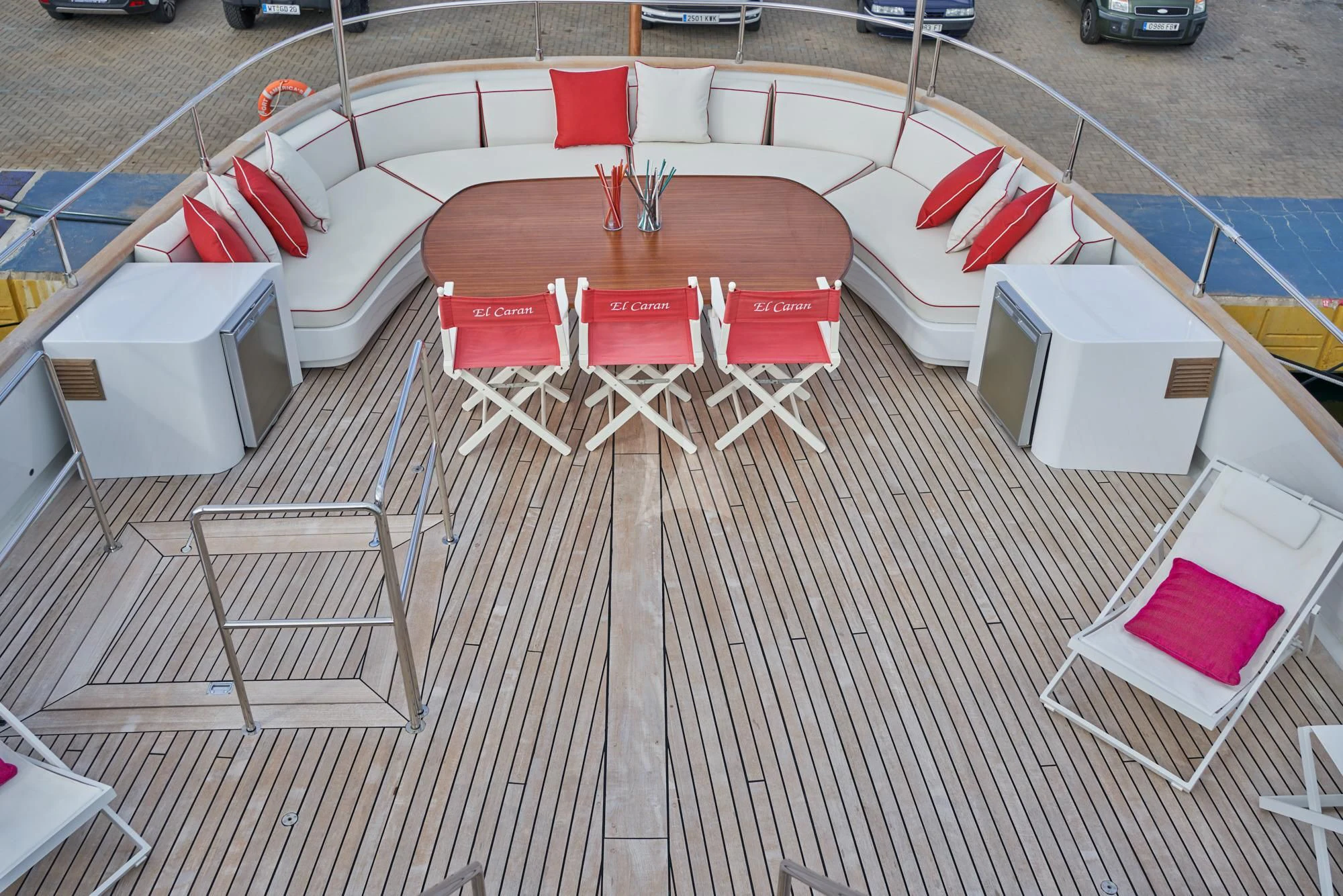 a table and chairs on a deck aboard DENEB'S DAUGHTERS Yacht for Sale