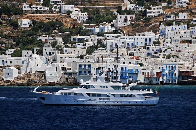 a large white boat in the water aboard DENEB'S DAUGHTERS Yacht for Sale