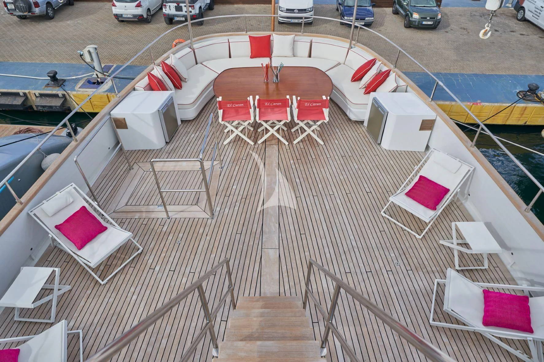 a deck with chairs and tables aboard DENEB'S DAUGHTERS Yacht for Sale