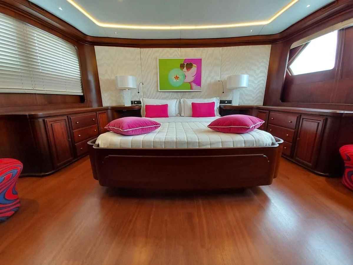 a bed in a room aboard DENEB'S DAUGHTERS Yacht for Sale