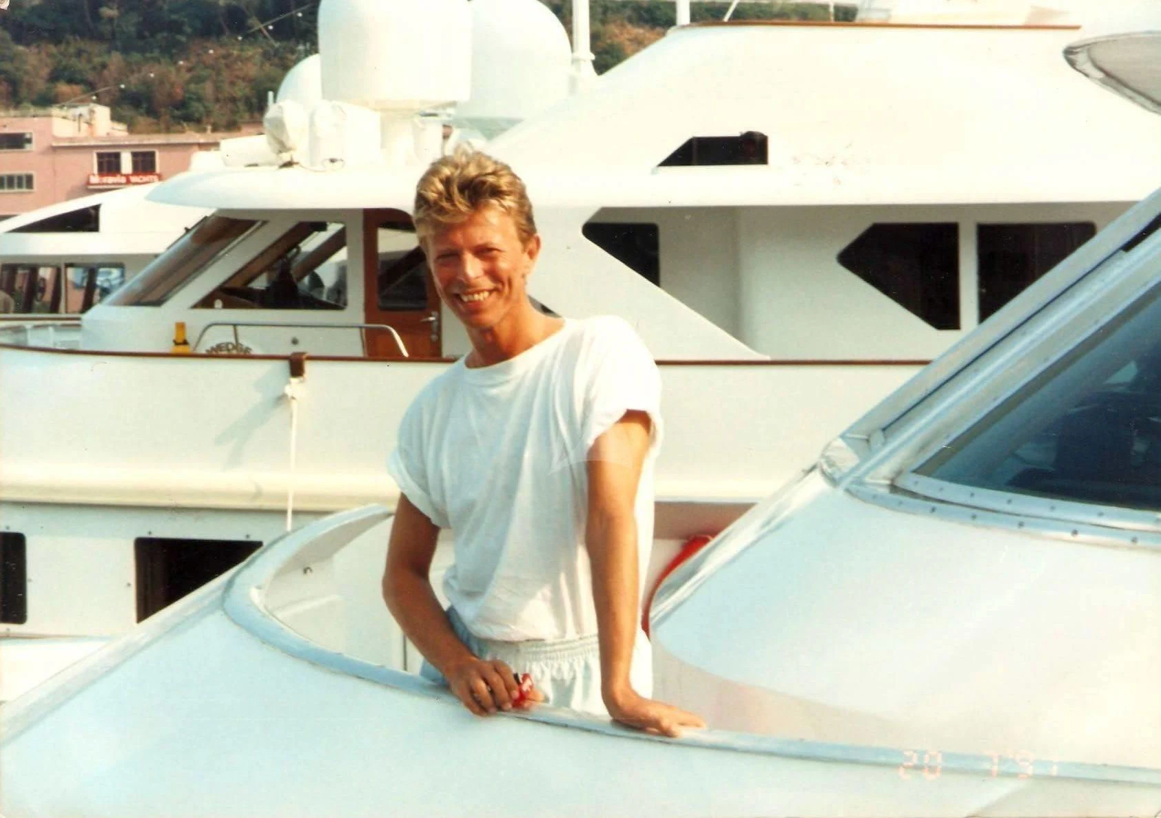 David Bowie leaning on a boat aboard DENEB'S DAUGHTERS Yacht for Sale