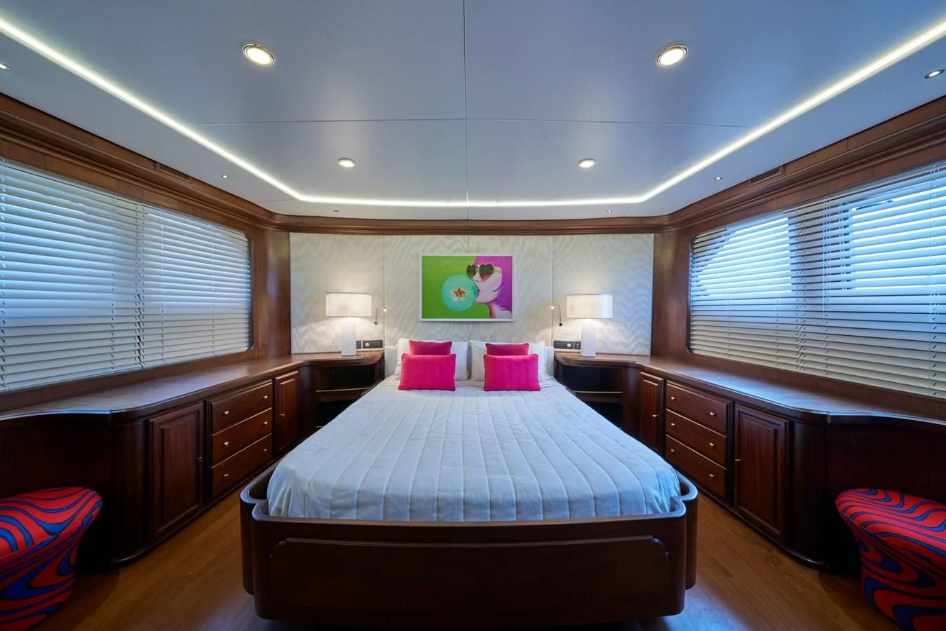 a bedroom with a large bed aboard DENEB'S DAUGHTERS Yacht for Sale