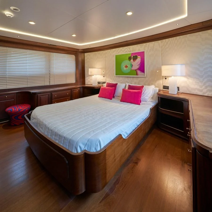 a bedroom with a large bed aboard DENEB'S DAUGHTERS Yacht for Sale