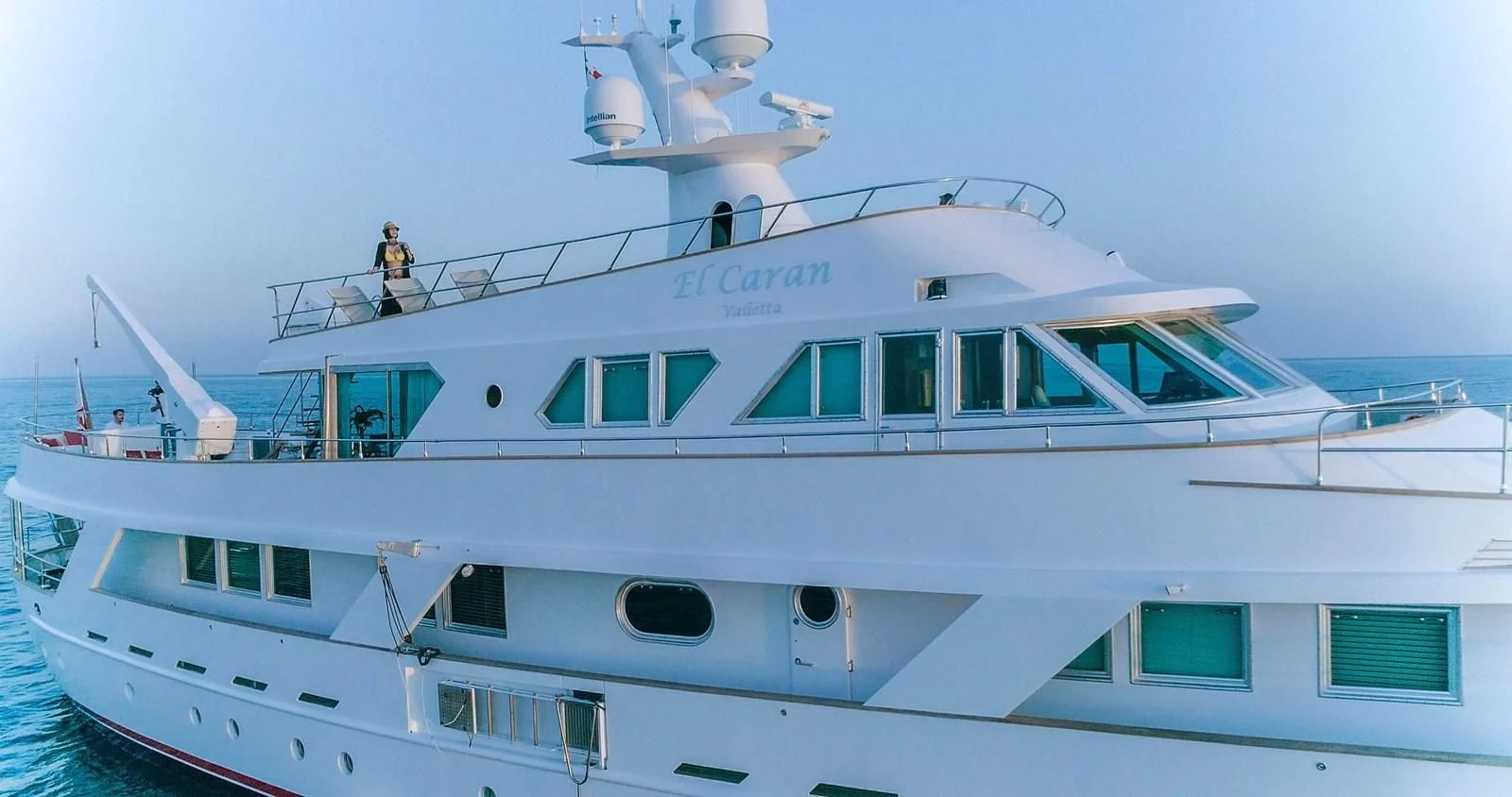 a white yacht with a white roof aboard DENEB'S DAUGHTERS Yacht for Sale