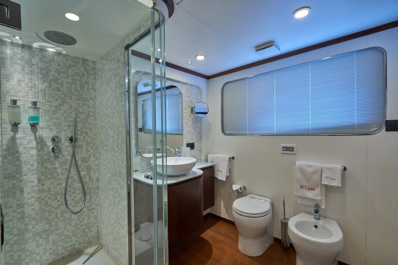 a bathroom with a glass shower aboard DENEB'S DAUGHTERS Yacht for Sale