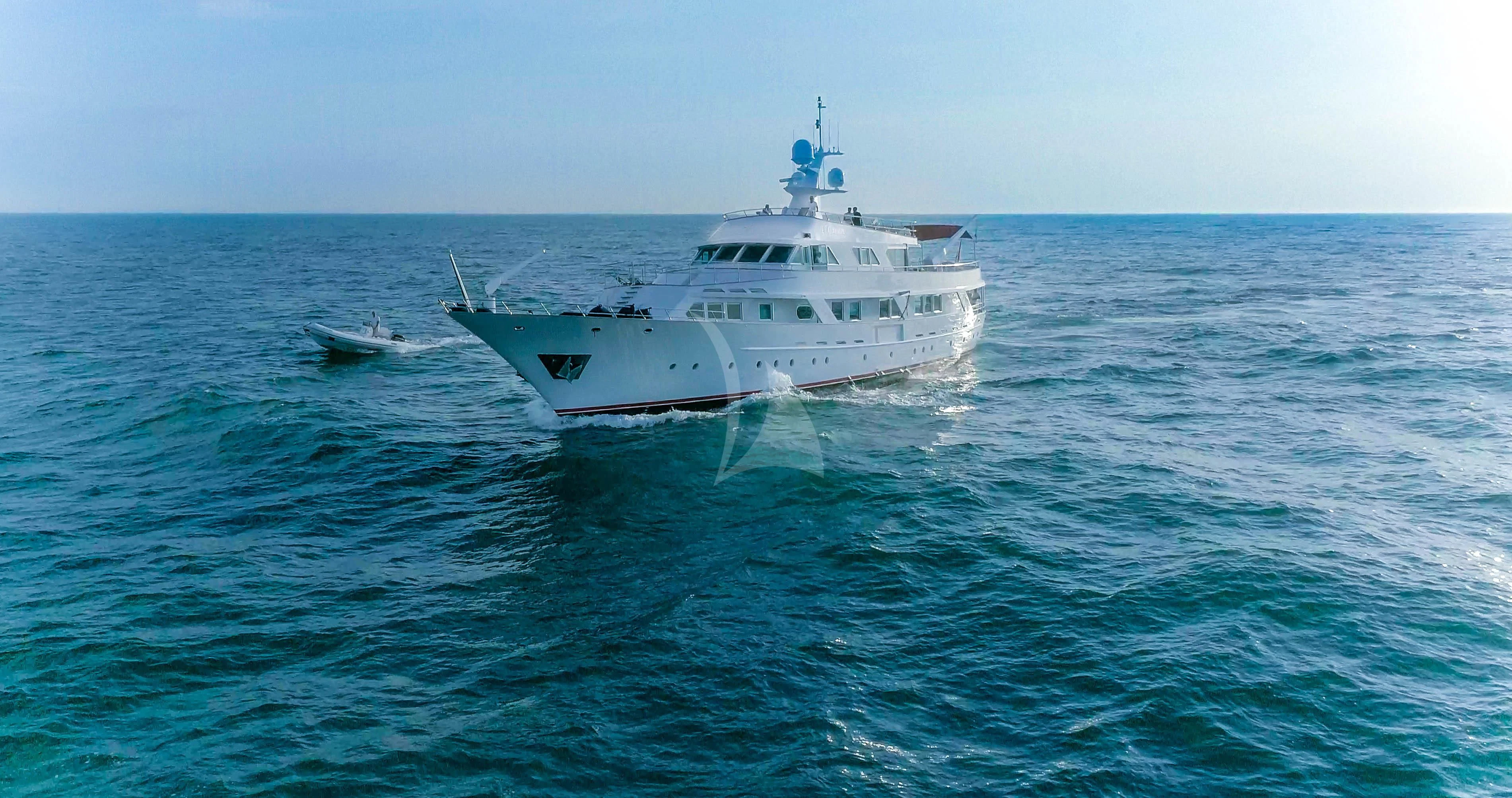 a couple of white boats in the ocean aboard DENEB'S DAUGHTERS Yacht for Sale