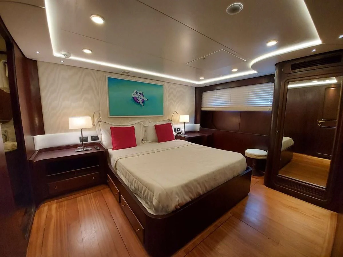 a hotel room with a large bed aboard DENEB'S DAUGHTERS Yacht for Sale