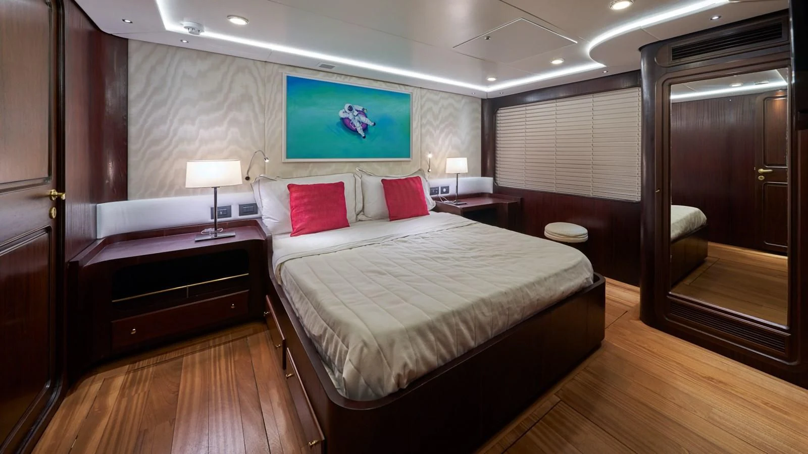 a hotel room with a bed and desk aboard DENEB'S DAUGHTERS Yacht for Sale