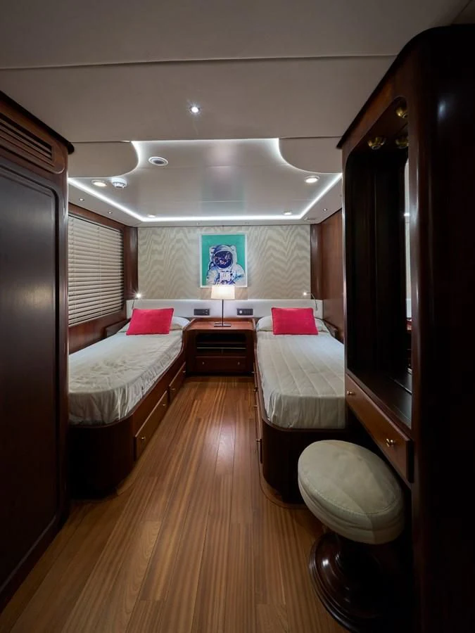a hotel room with two beds aboard DENEB'S DAUGHTERS Yacht for Sale