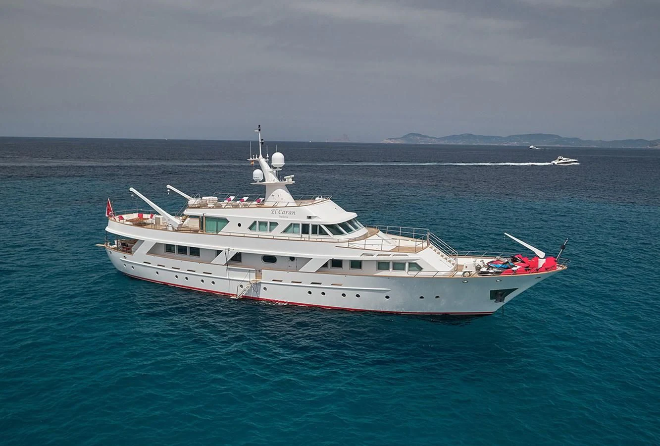 a large white boat in the water aboard DENEB'S DAUGHTERS Yacht for Sale