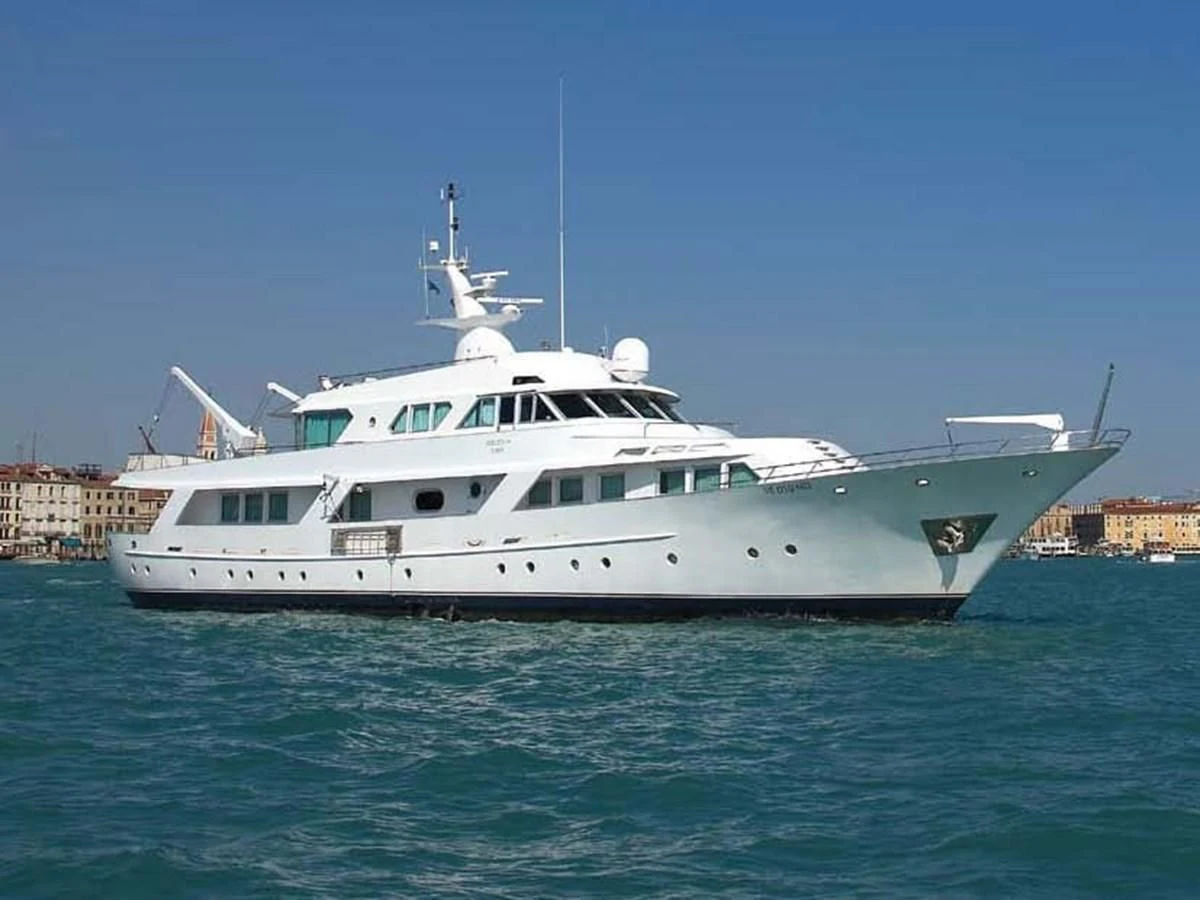 a large white boat in the water aboard DENEB'S DAUGHTERS Yacht for Sale