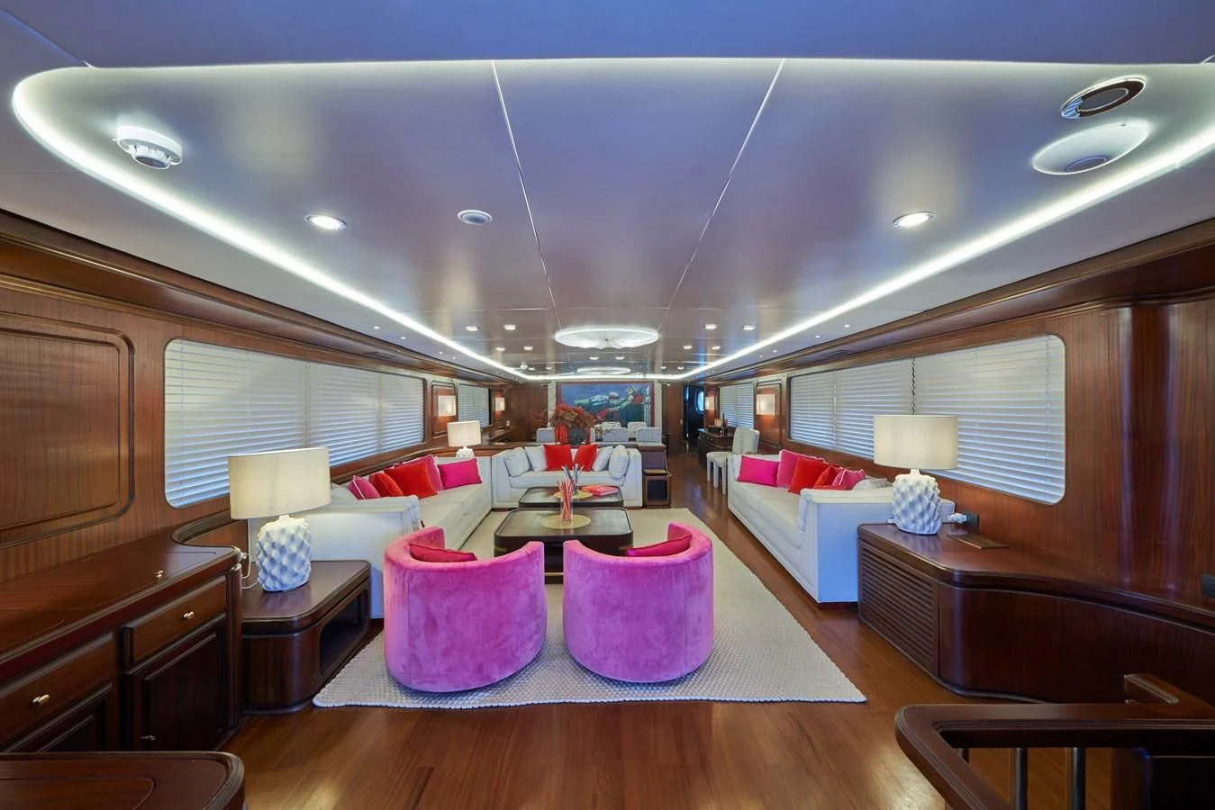 a living room with a couch and a table aboard DENEB'S DAUGHTERS Yacht for Sale