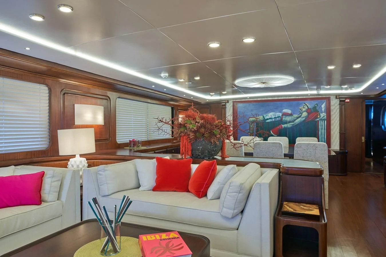 a living room with a couch and a table aboard DENEB'S DAUGHTERS Yacht for Sale