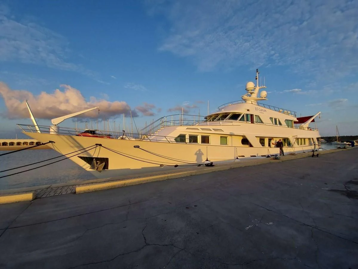 a boat docked at a pier aboard DENEB'S DAUGHTERS Yacht for Sale