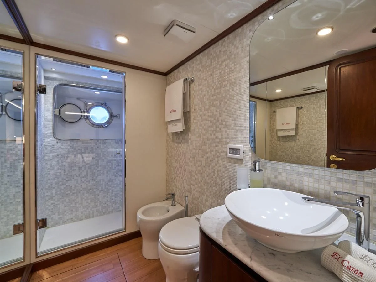 a bathroom with a sink and toilet aboard DENEB'S DAUGHTERS Yacht for Sale