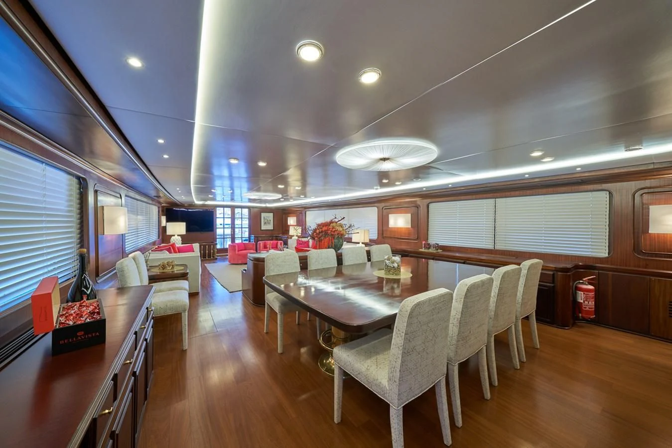 a large room with a table and chairs aboard DENEB'S DAUGHTERS Yacht for Sale