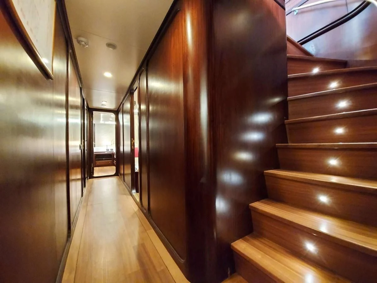 a hallway with wood doors aboard DENEB'S DAUGHTERS Yacht for Sale