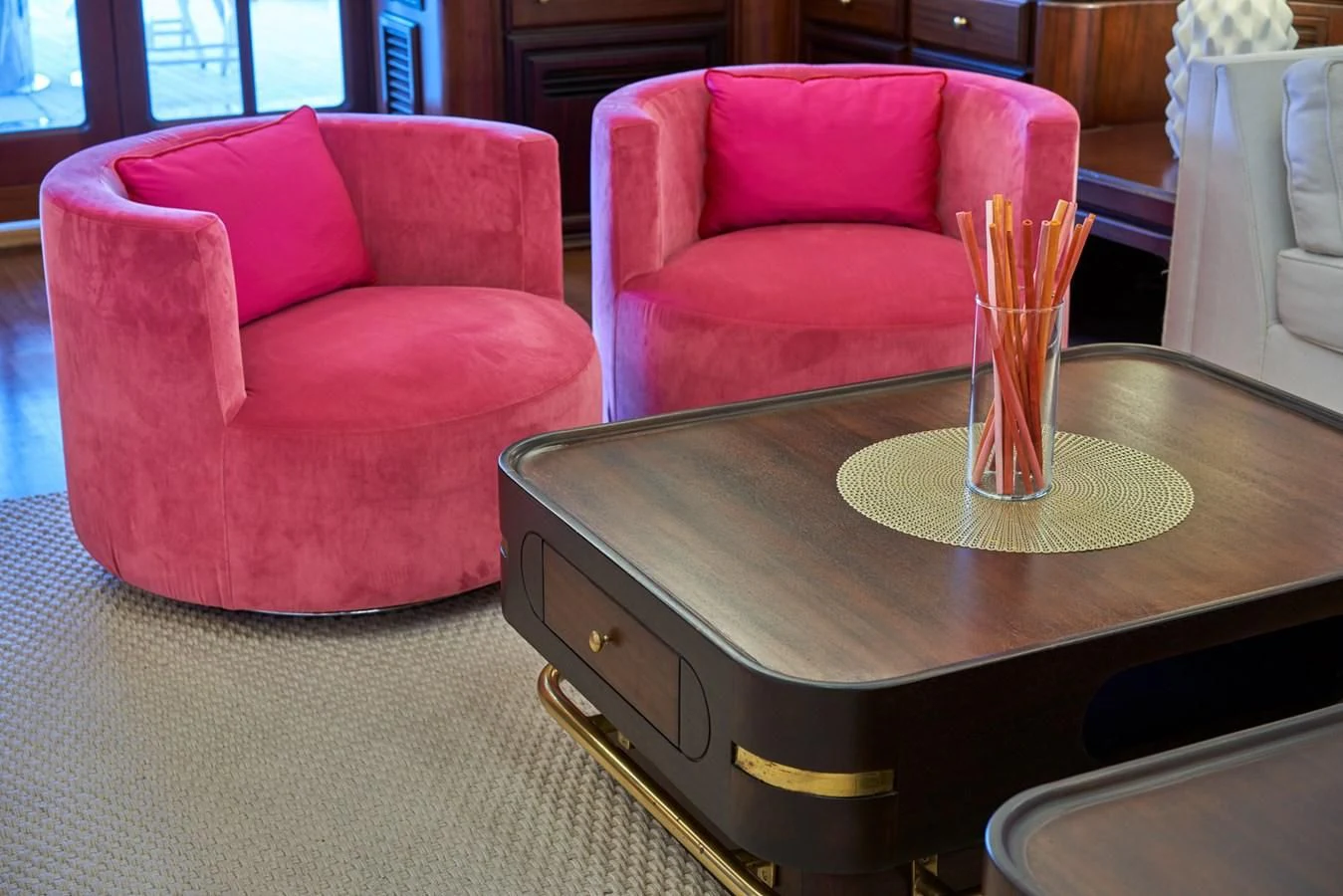 a table with chairs and a coffee table with a tray of pencils aboard DENEB'S DAUGHTERS Yacht for Sale