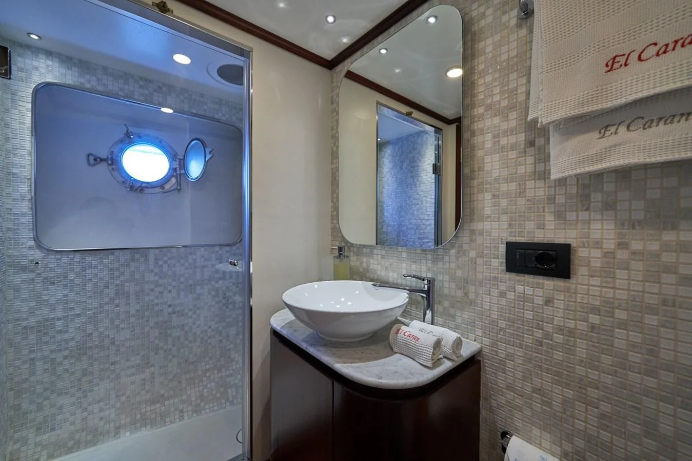 a bathroom with a sink and a mirror aboard DENEB'S DAUGHTERS Yacht for Sale