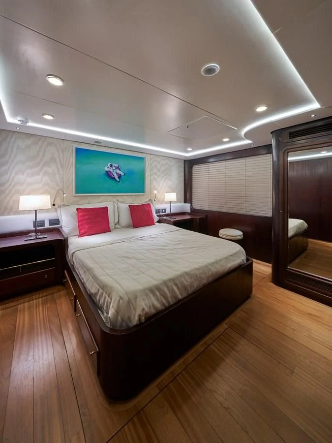 a hotel room with a bed aboard DENEB'S DAUGHTERS Yacht for Sale