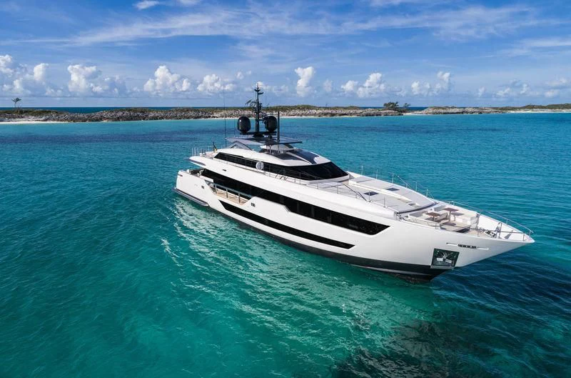 a white boat in the water aboard NEVER BLUE Yacht for Sale