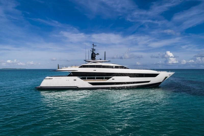 a white yacht in the water aboard NEVER BLUE Yacht for Sale