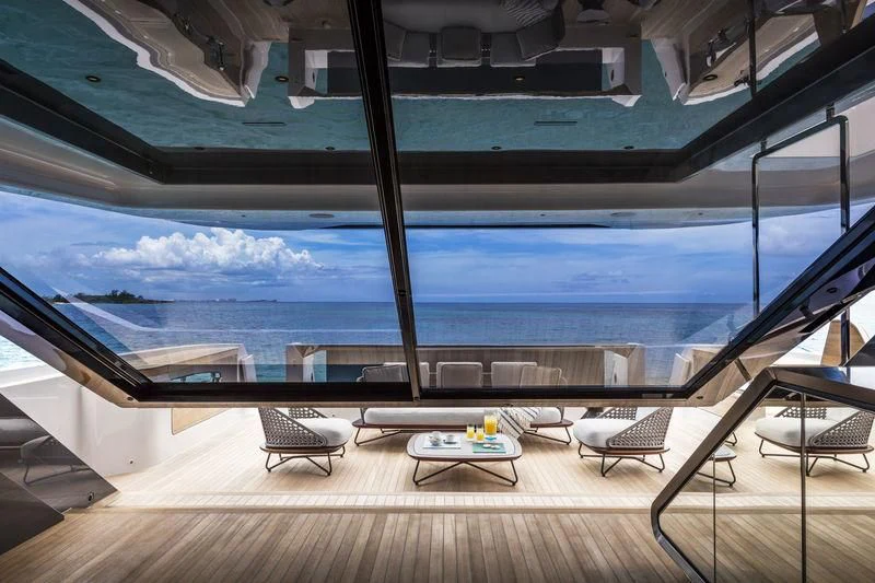 a room with a large window overlooking the ocean aboard NEVER BLUE Yacht for Sale